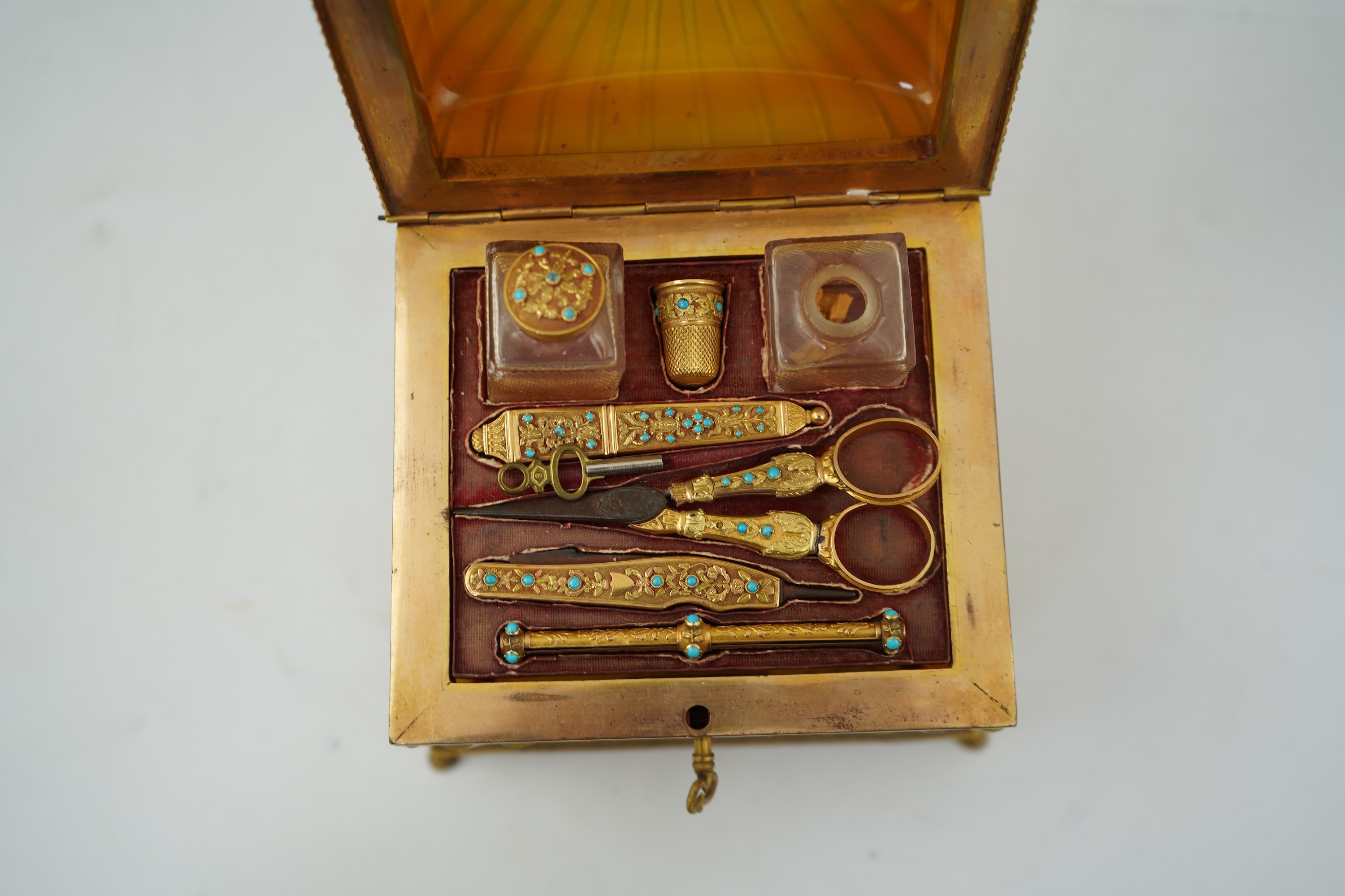 A mid 19th century French opaline glass necessaire box with turquoise and gold mounted accessories